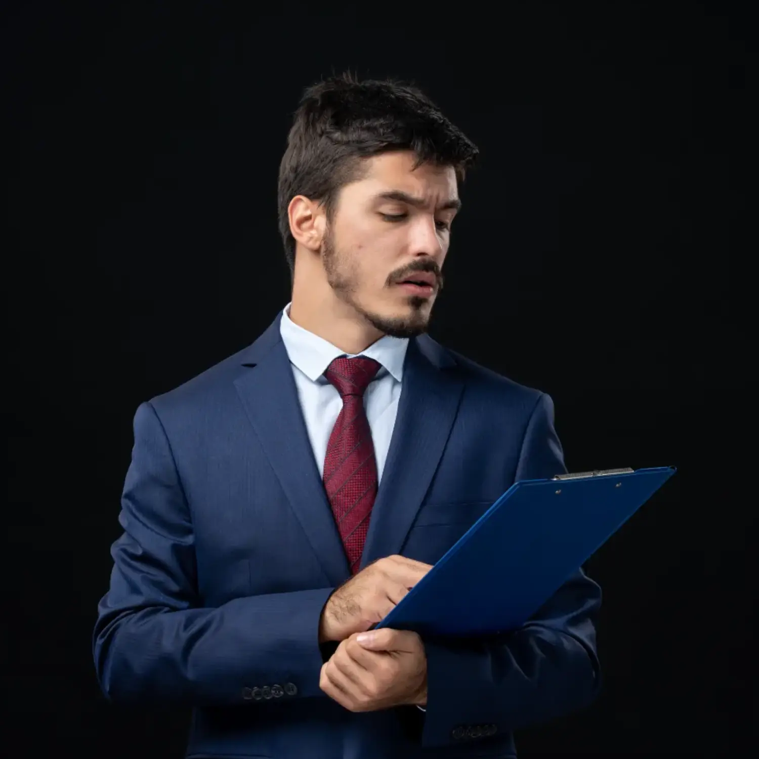young-male-office-worker-suit-holding-documents-isolated-dark-wall